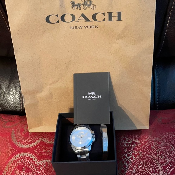 Brand new Coach women watch with tag and box